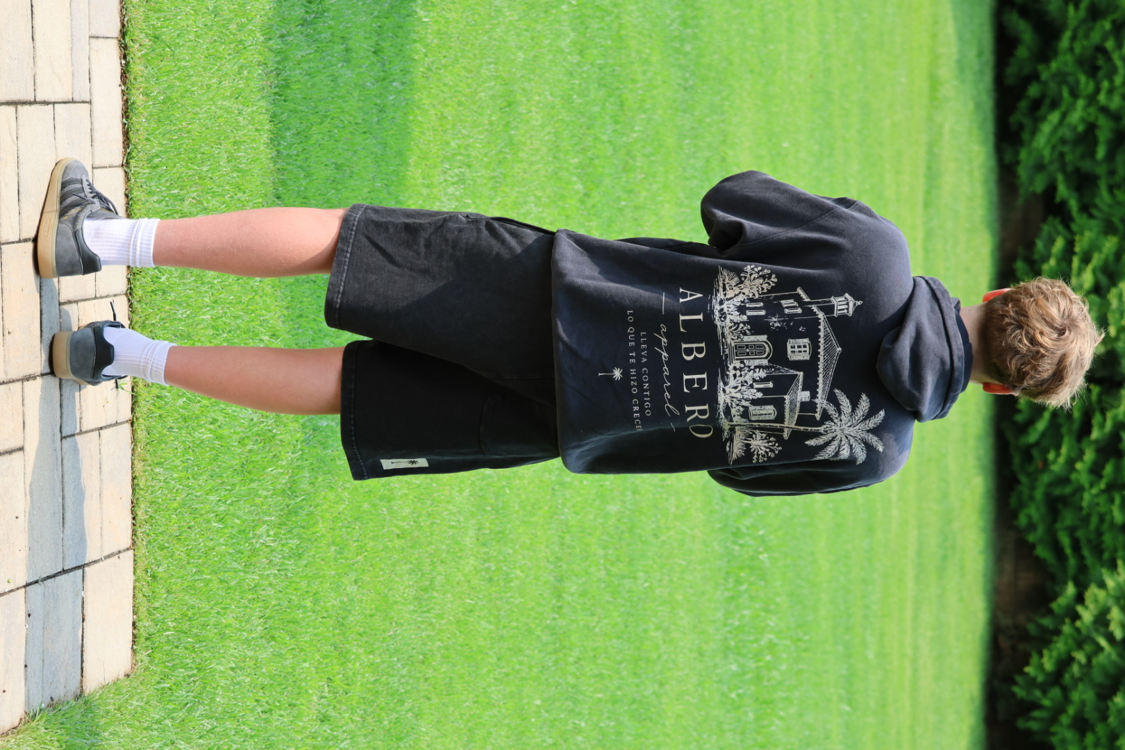 Albero Signature Hoodie worn by model — back view